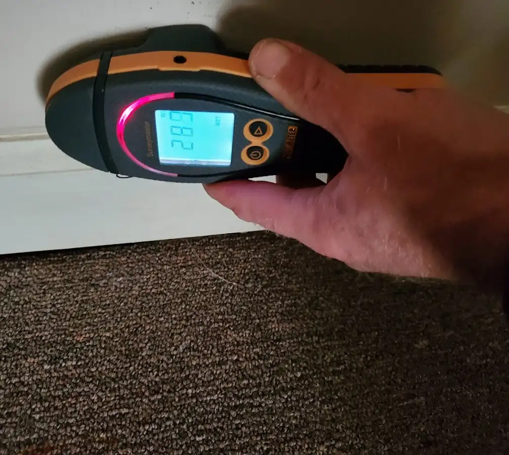 Moisture detection at baseboard during Sewage Cleanup & Sanitation in Town of Pecos